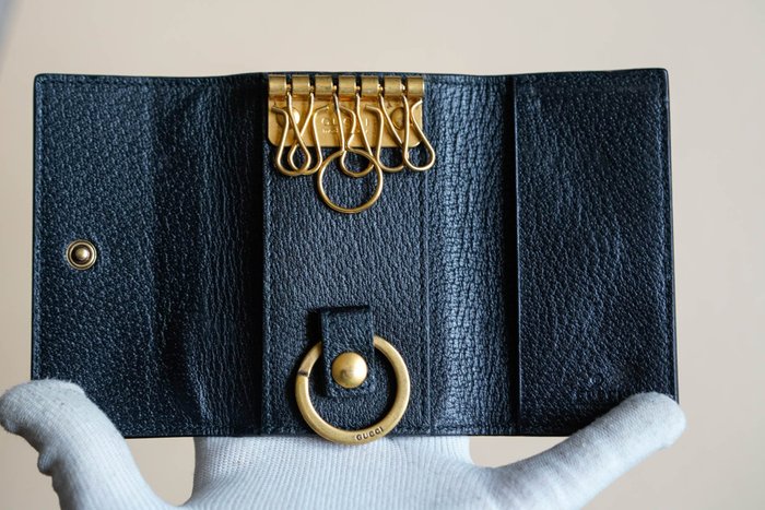 Gucci Black Leather Key Case with Star and Bee Motifs