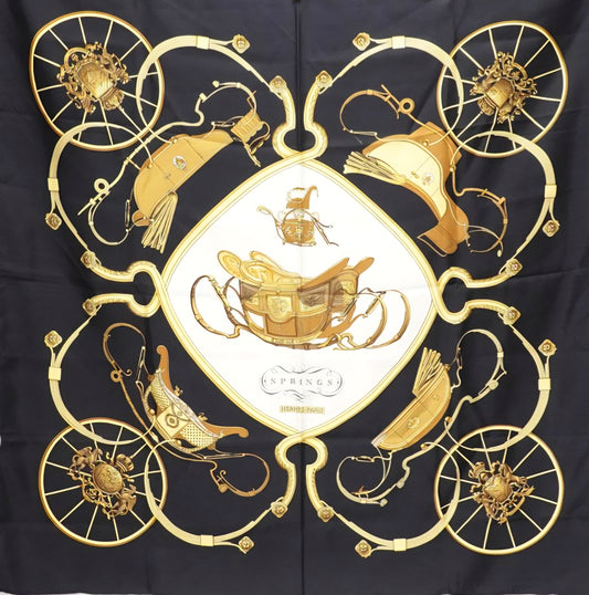 Hermès “Springs” Silk Carré Scarf 90 cm – Classic Equestrian Saddle Design