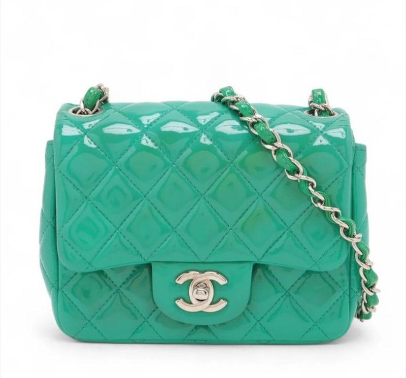 Chanel green patent leather purse with diamond quilting and silver-tone hardware.