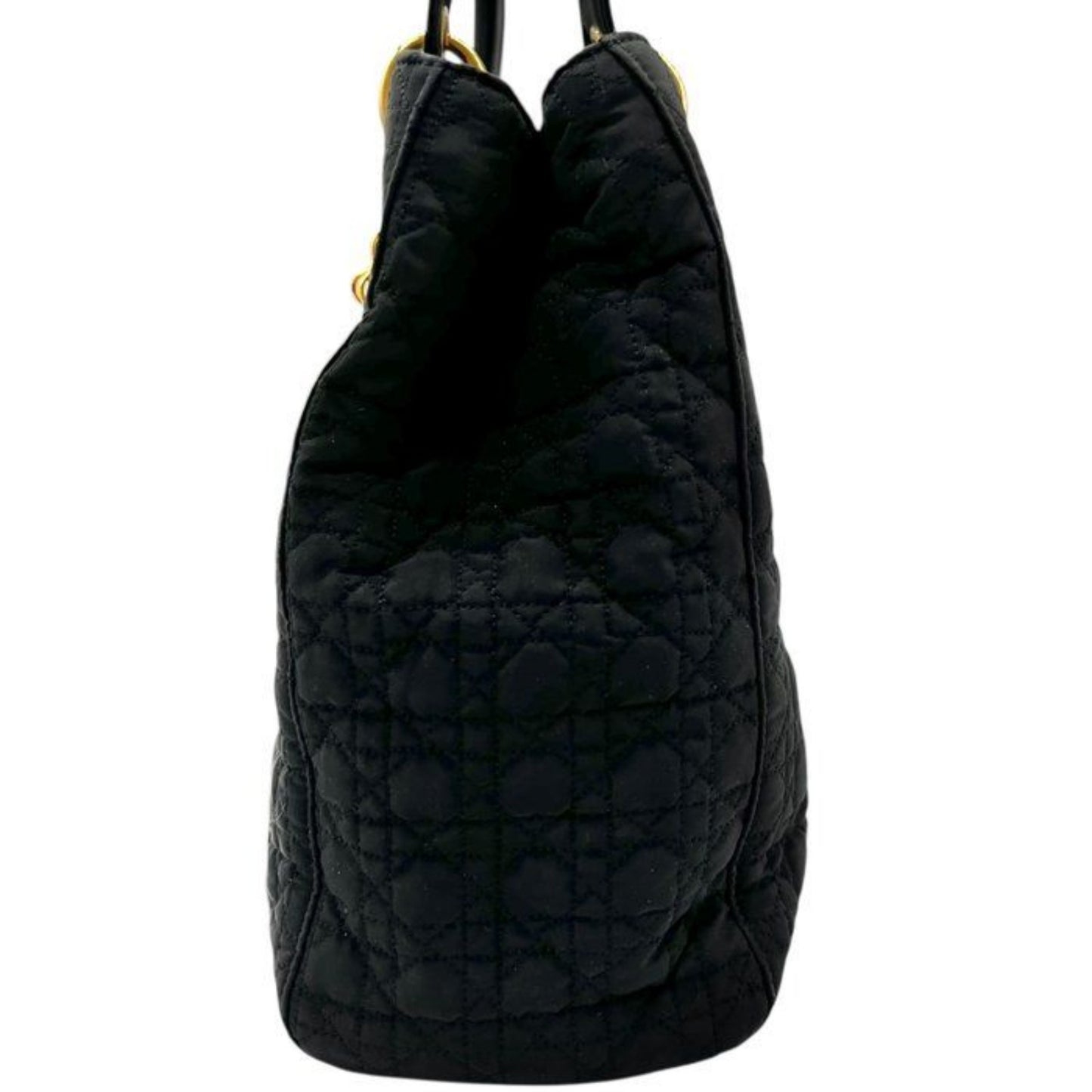 Christian Dior black quilted nylon tote bag with gold hardware and leather trim.