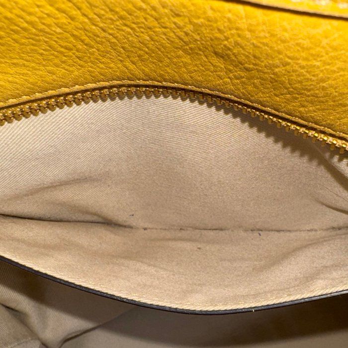 Chloè yellow suede and leather shoulder bag with gold-plated hardware and two-way design.