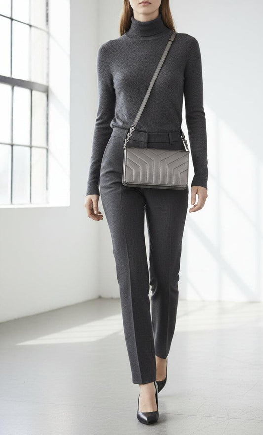 Yves Saint Laurent grey metallic shoulder bag with quilted design and silver tone hardware.