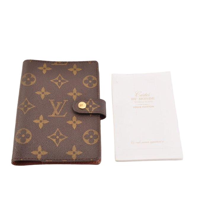 Louis Vuitton brown agenda cover coated canvas with iconic monogram pattern.