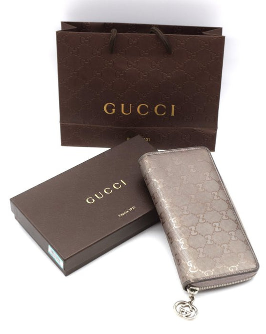 Gucci grey wallet, leather texture close-up