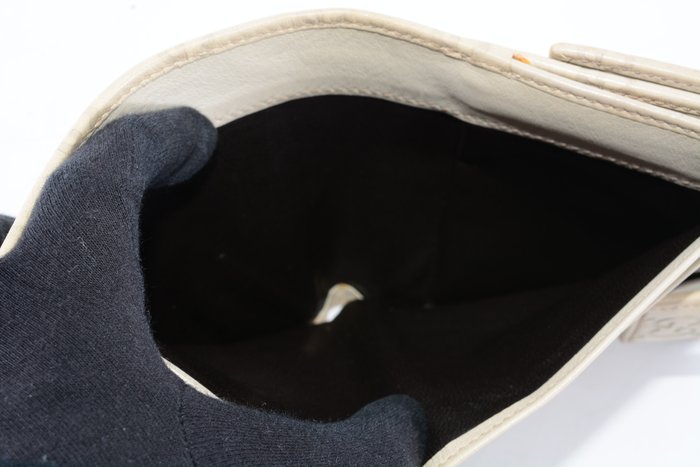 Gucci Guccissima Leather Wallet in Beige