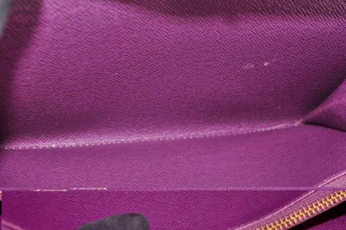 Portefeuille long en cuir Épi Louis Vuitton