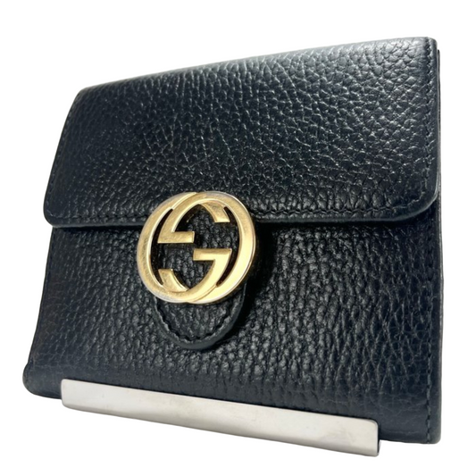 Portefeuille en cuir noir Gucci à deux volets