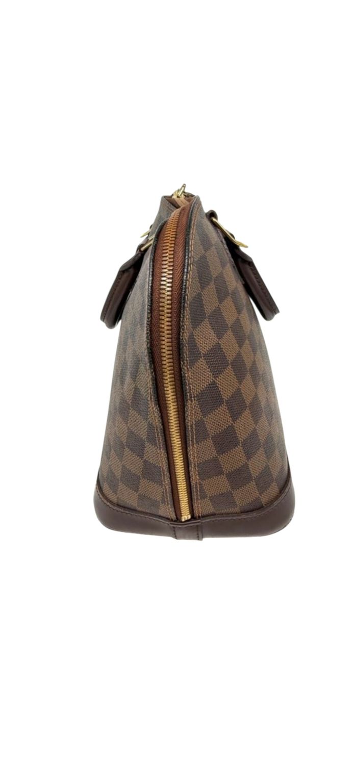 LV Alma PM, Damier Ebene canvas pattern close-up