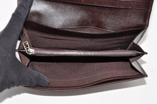 Fendi brown wallet, Zucca canvas pattern detail