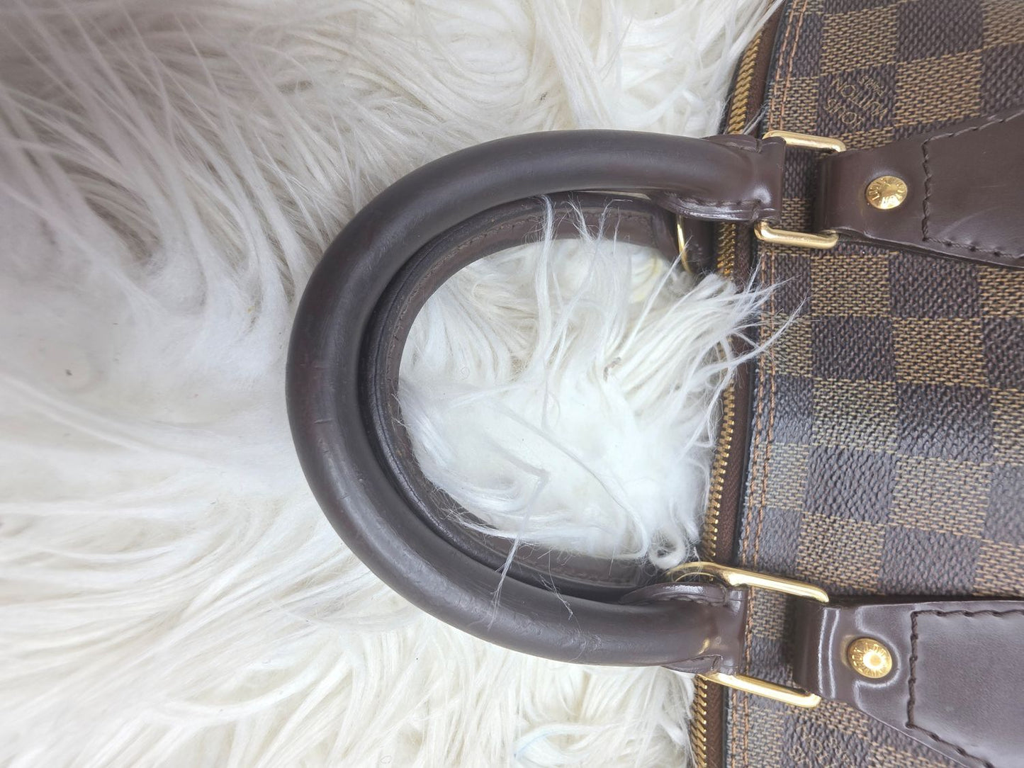 LV Alma PM, stitching detail