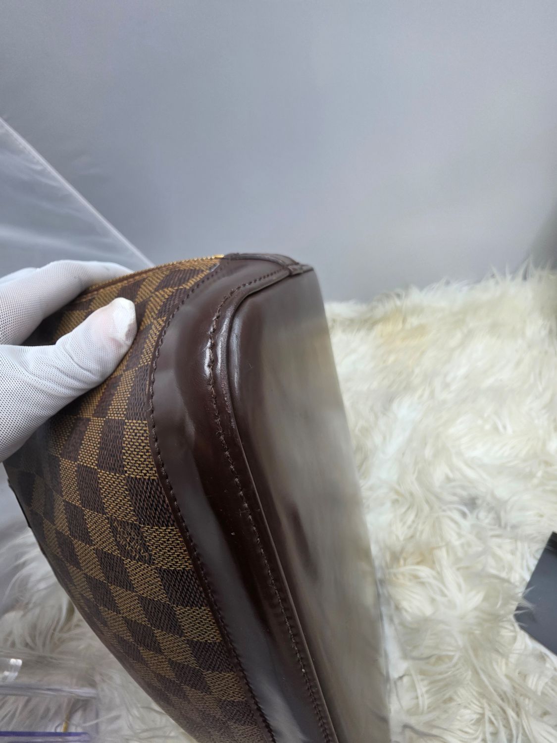 LV Alma PM, leather patina detail