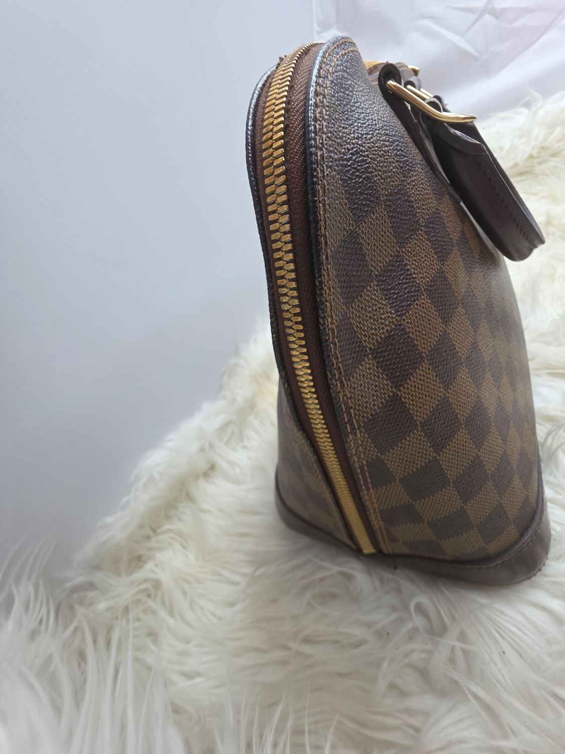 Louis Vuitton Alma PM Handbag in Classic Damier Ebene Canvas