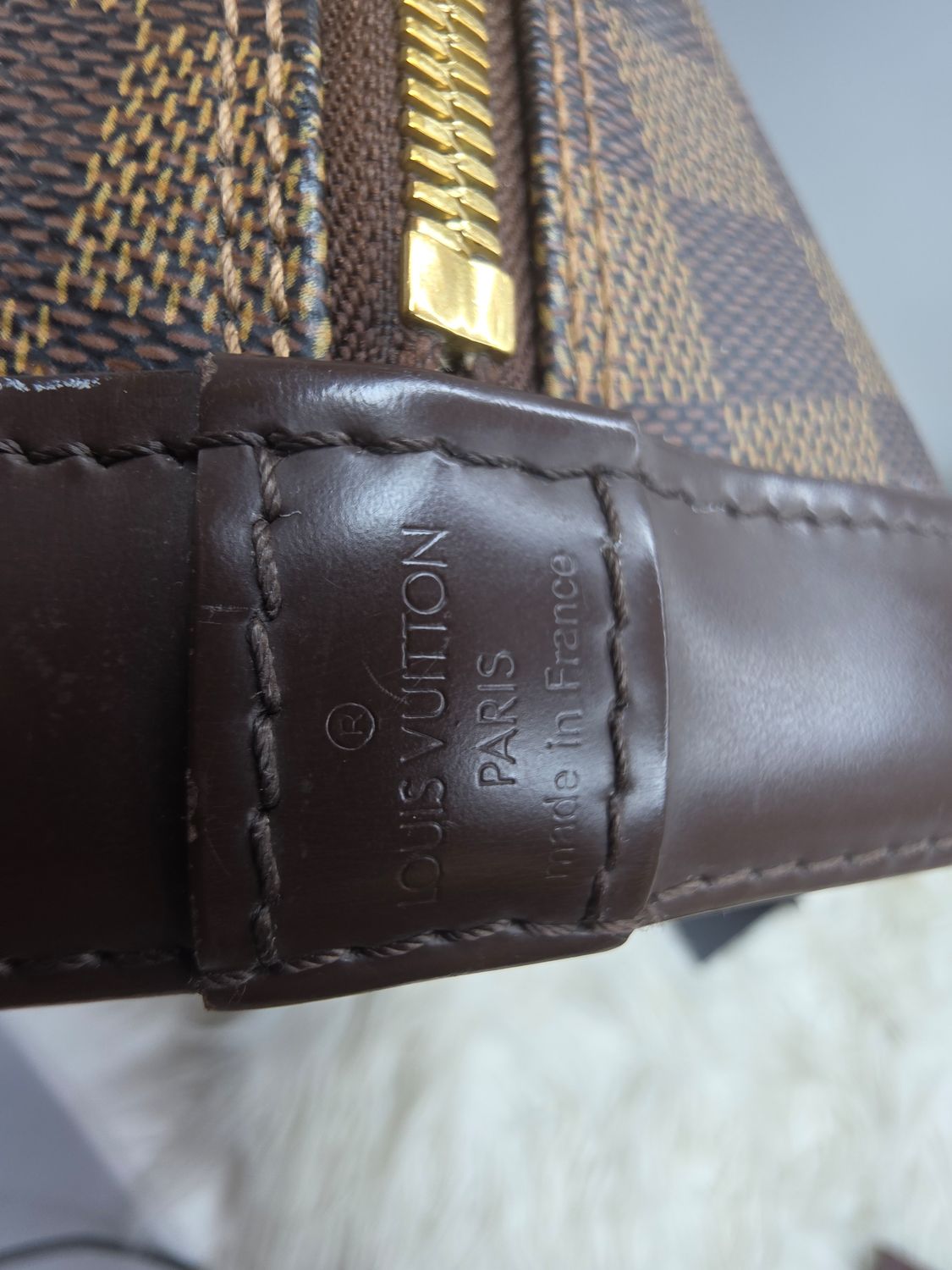LV Alma PM, condition close-up view 7