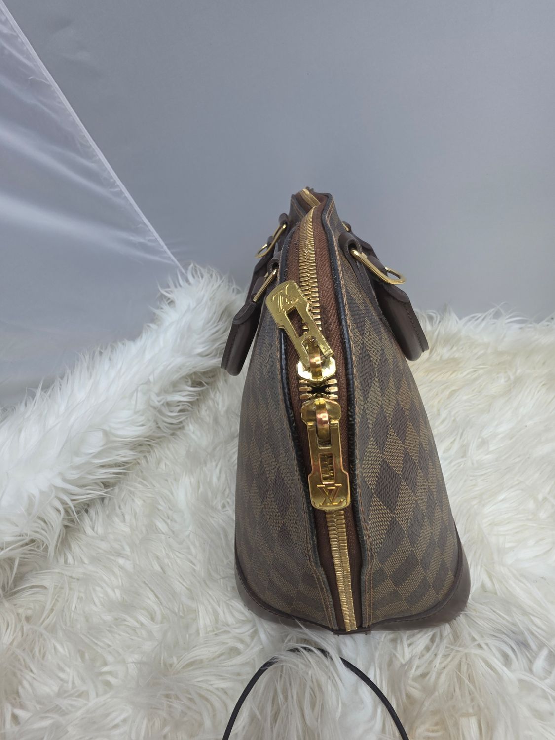 Louis Vuitton Alma PM Handbag in Classic Damier Ebene Canvas