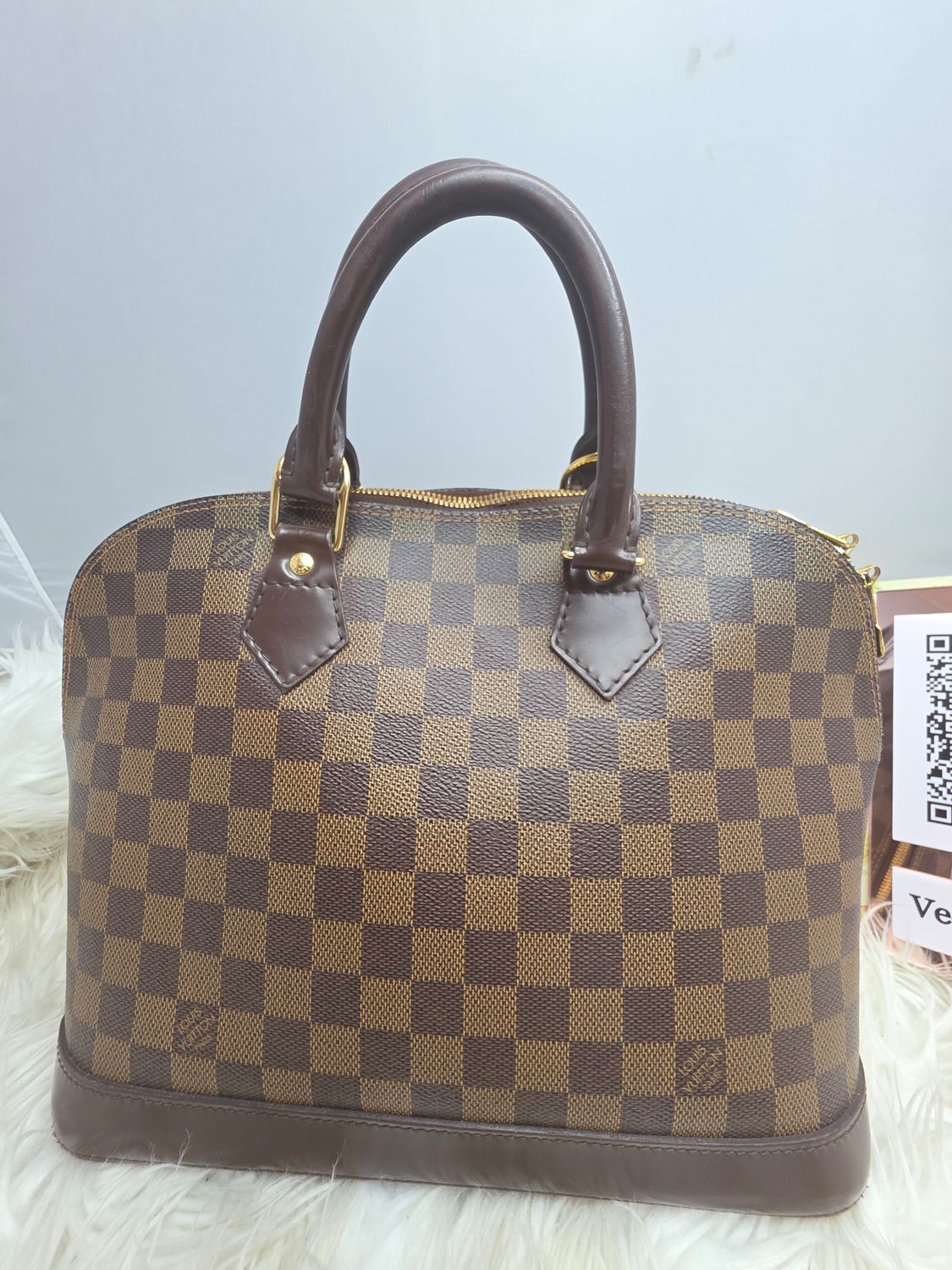 Louis Vuitton Alma PM Handbag in Classic Damier Ebene Canvas
