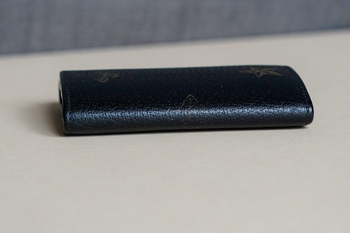 Gucci Black Leather Key Case with Star and Bee Motifs