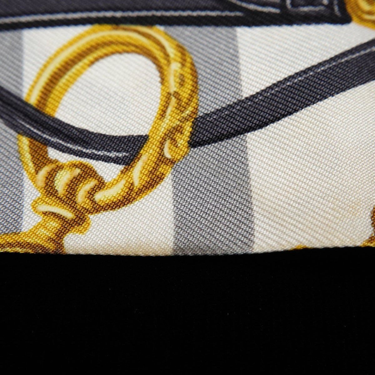 Hermès Twilly “Brides de Gala Bayadère” White and Yellow Silk Scarf