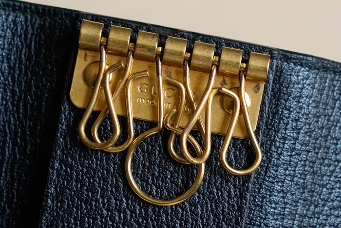 Gucci Black Leather Key Case with Star and Bee Motifs