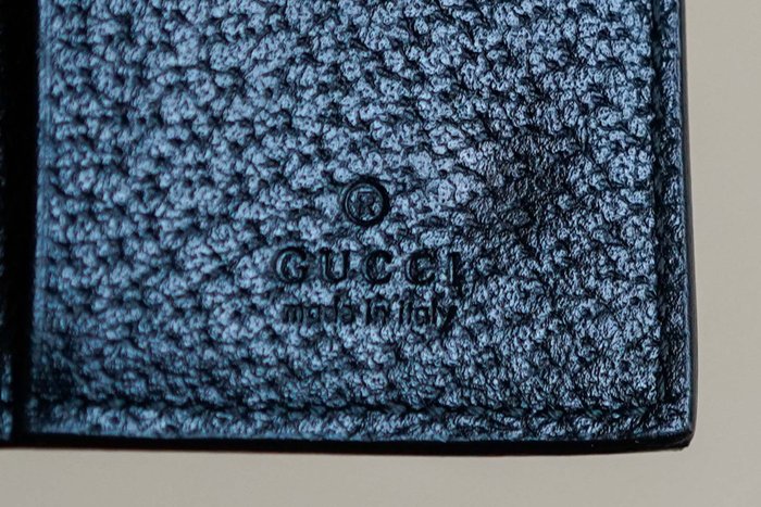 Gucci Black Leather Key Case with Star and Bee Motifs