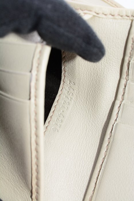 Gucci Guccissima Leather Wallet in Beige