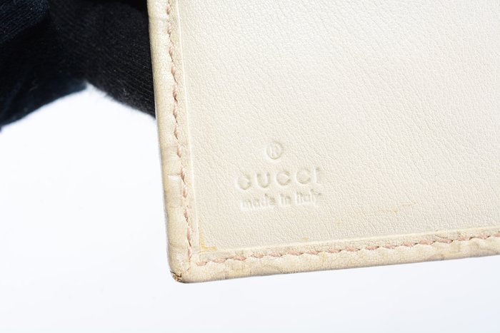 Gucci Guccissima Leather Wallet in Beige