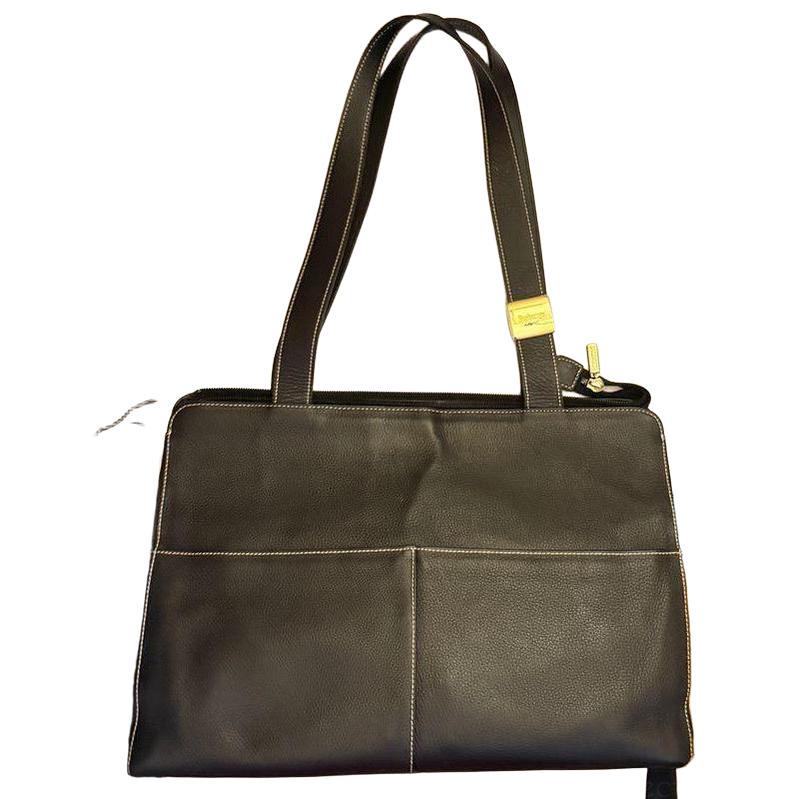 Burberry black tote bag with Nova Check accents and premium calf leather finish.