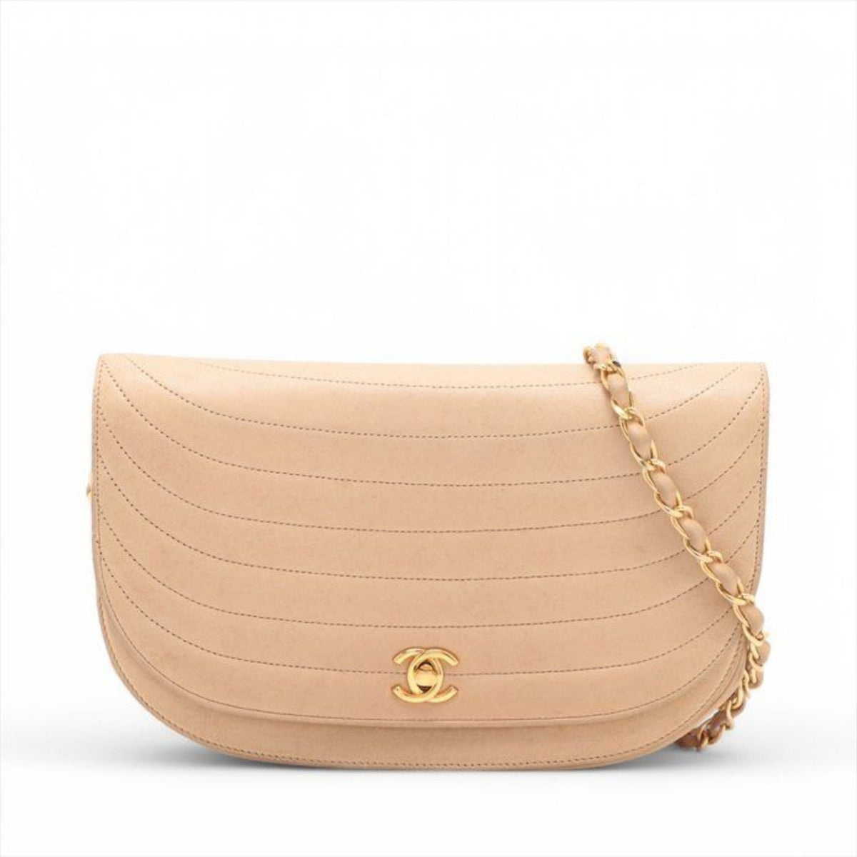 CHANEL beige matelassé leather half moon shoulder bag with gold hardware and classic logo.