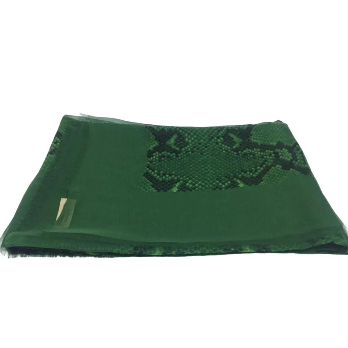 Burberry green silk scarf with delicate fringed edges and vibrant hue.