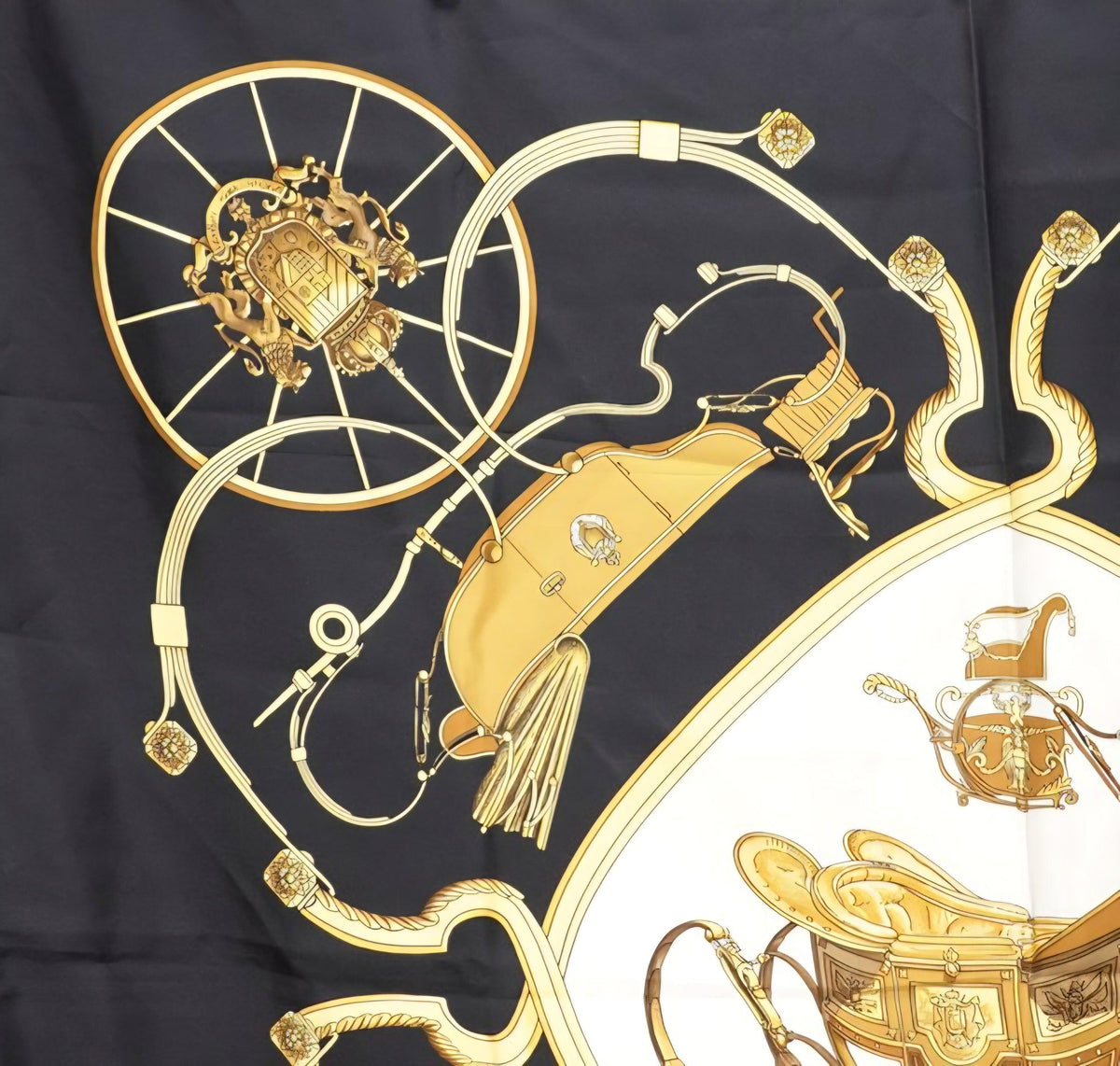 Hermès silk carré scarf black gold multi equestrian saddle design with intricate detailing.