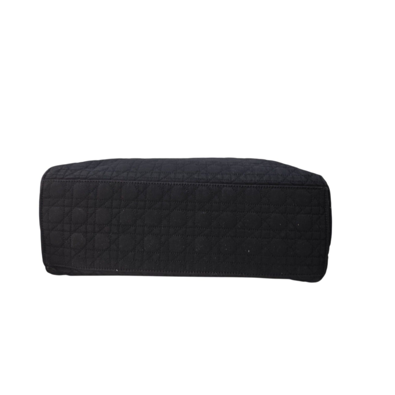 Christian Dior black quilted nylon tote bag with gold hardware and leather trim.