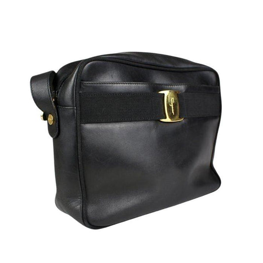 Salvatore Ferragamo black leather crossbody bag with gold Vara bow and hardware.