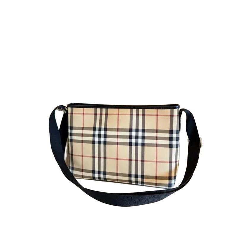 Burberry beige messenger bag with classic Nova Check pattern and silver-tone hardware.