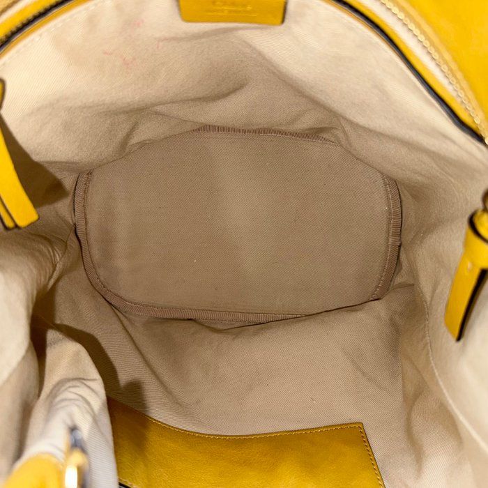 Chloè yellow suede and leather shoulder bag with gold-plated hardware and two-way design.