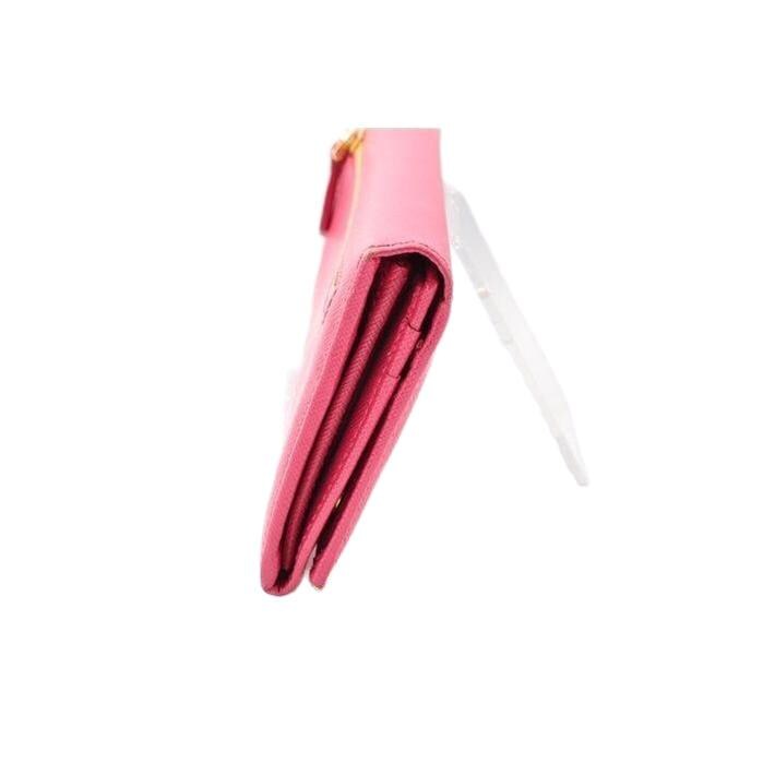 Prada pink leather wallet with logo detail and slim design, perfect for essentials.