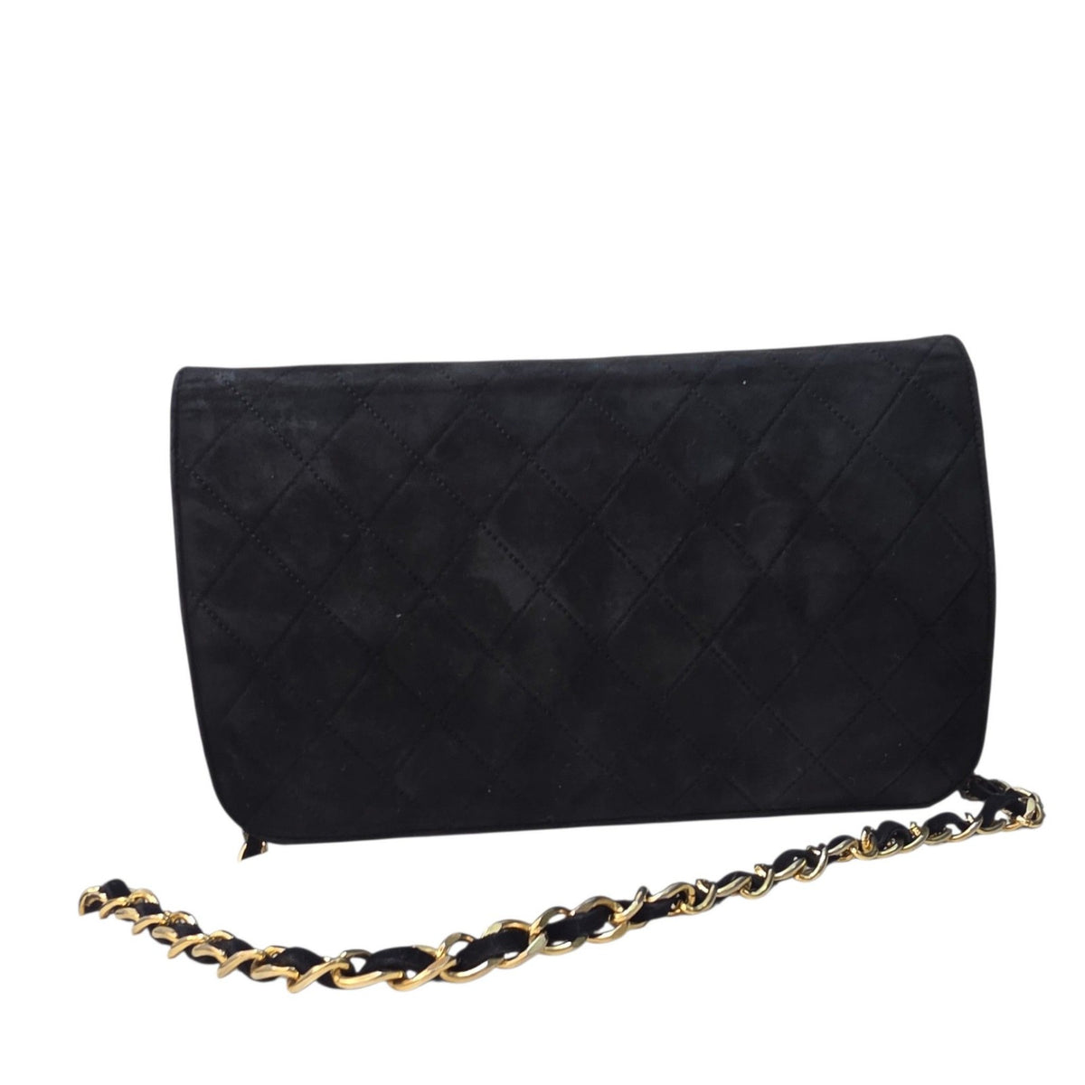 Chanel black quilted suede crossbody bag with gold chain and leather woven strap.