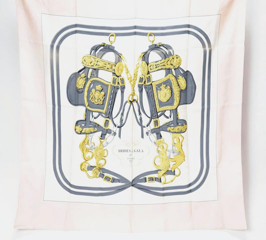 Hermès silk scarf cream grey multi Brides de Gala design with ornate bridle pattern.