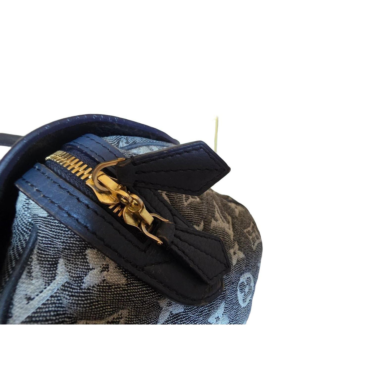 Louis Vuitton gold and grey handbag with monogram canvas and gold-plated accents.