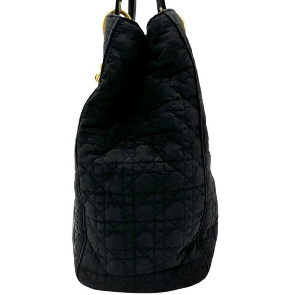 Christian Dior black quilted nylon tote bag with gold hardware and leather trim.