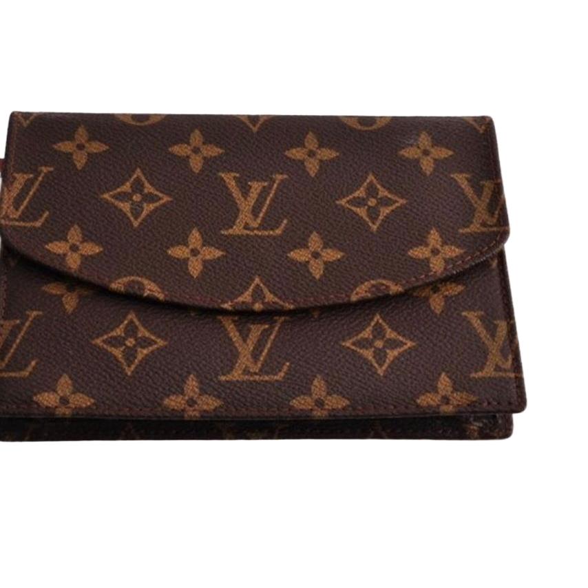 Louis Vuitton brown card case with monogram canvas and smooth leather trim.