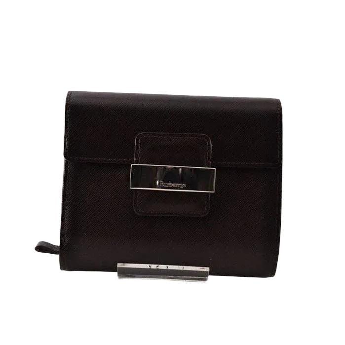 Burberry brown leather bifold wallet with embossed logo and classic design.