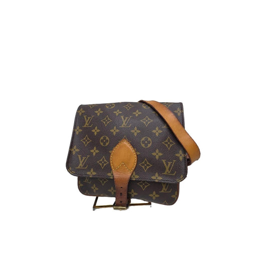 Louis Vuitton brown crossbody bag with iconic monogram canvas and aged leather trim.