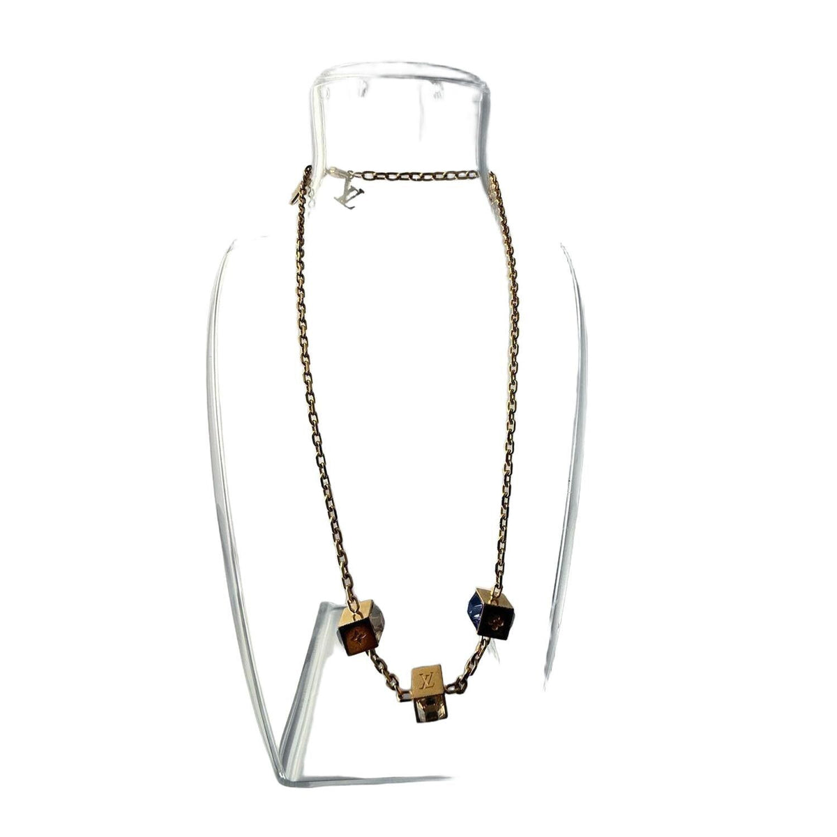 Louis Vuitton gold necklace with monogram dice charms and sparkling crystals.