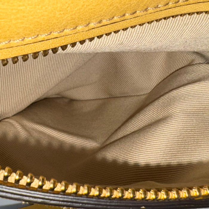 Chloè yellow suede and leather shoulder bag with gold-plated hardware and two-way design.