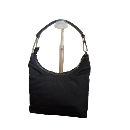 Gucci black nylon and leather shoulder bag with silver accents and logo detail.