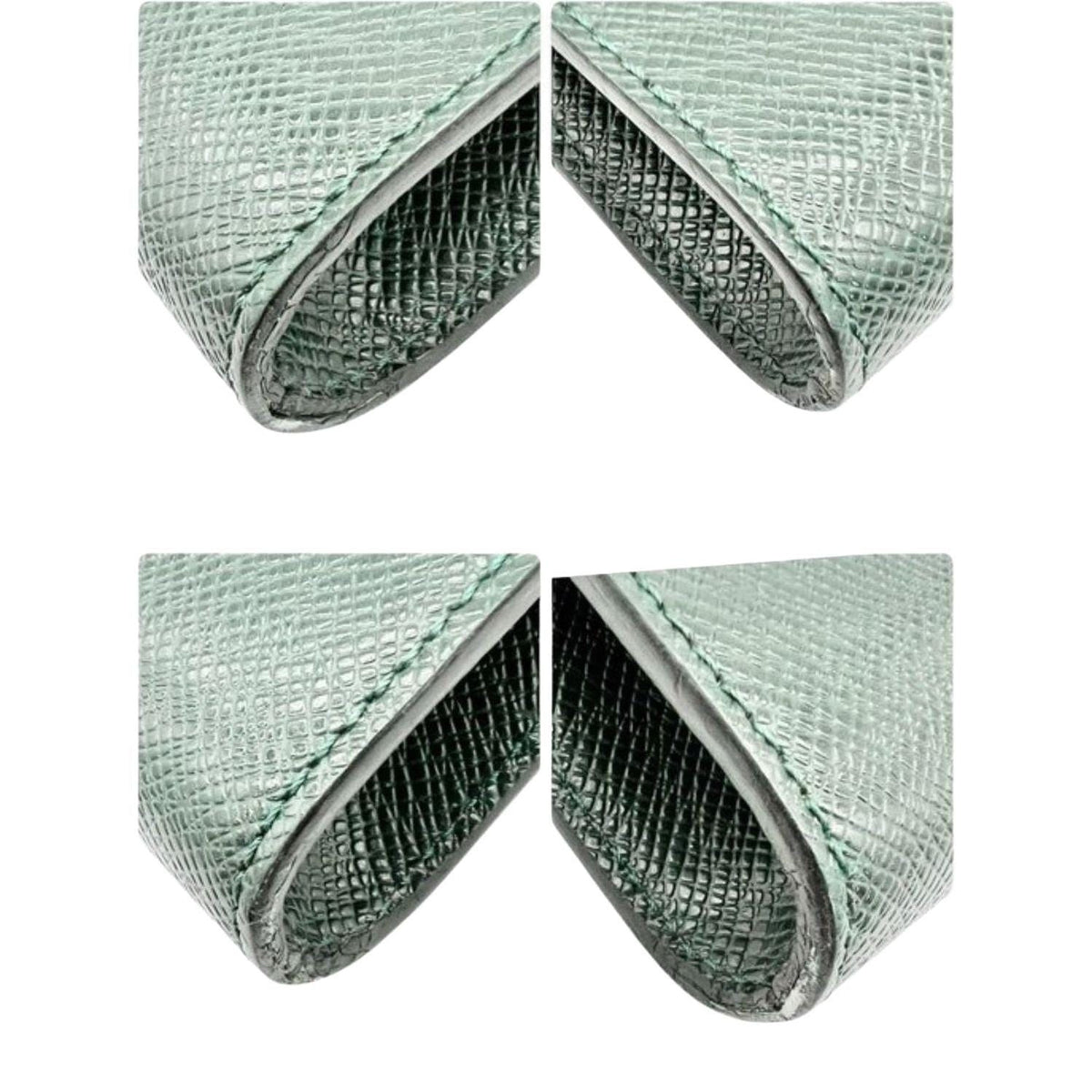 Louis Vuitton gold and green Volga clutch bag in Taiga leather with gold-tone hardware.