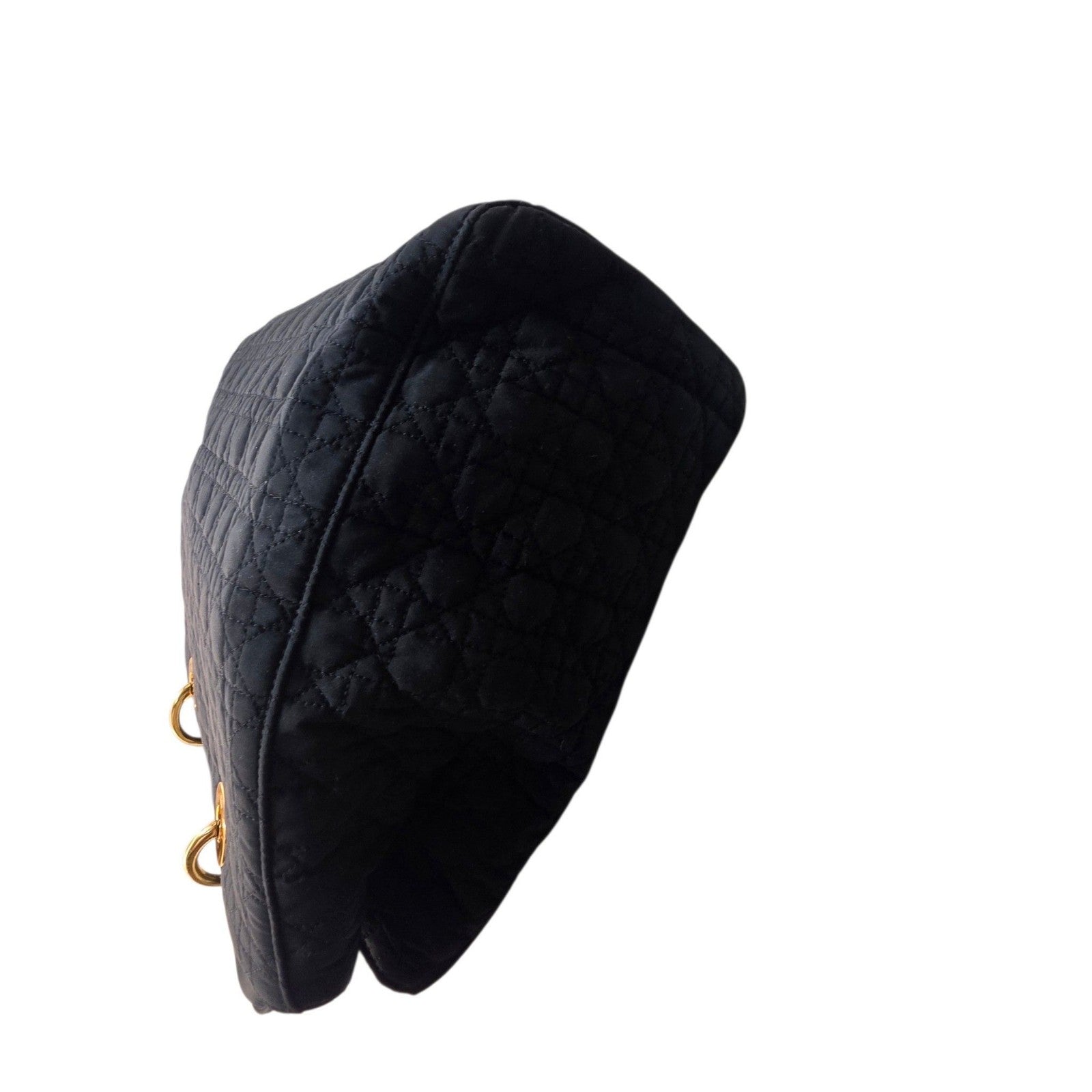 Christian Dior black quilted nylon tote bag with gold hardware and leather trim.
