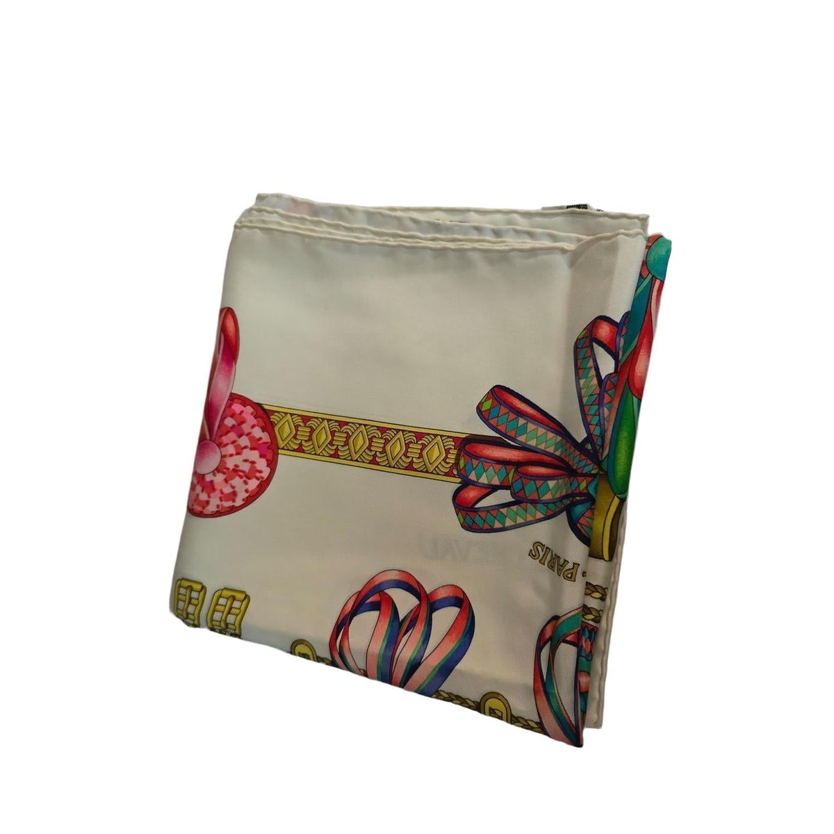 Hermès beige silk scarf featuring equestrian ribbon pattern and hand-rolled edges.