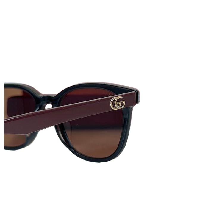 Gucci multicolour sunglasses with sleek frame and logo detail, excellent condition.