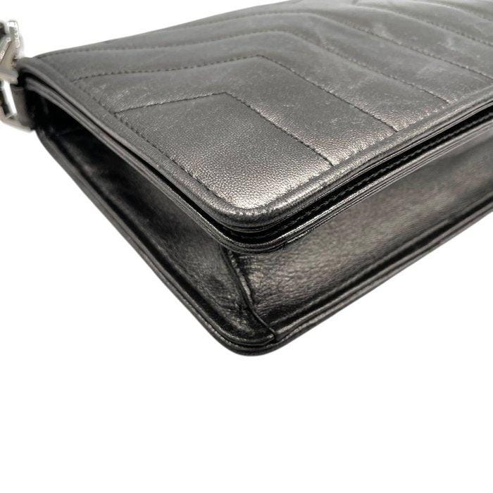 Yves Saint Laurent grey metallic shoulder bag with quilted design and silver tone hardware.