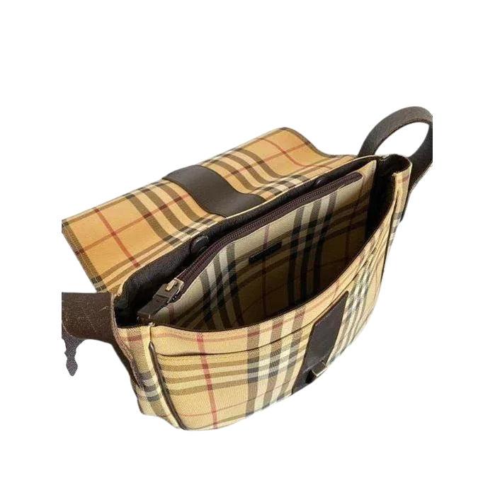 Burberry beige tote bag with iconic Nova Check pattern and leather accents.